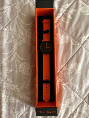 Projects watch new, black and orange
