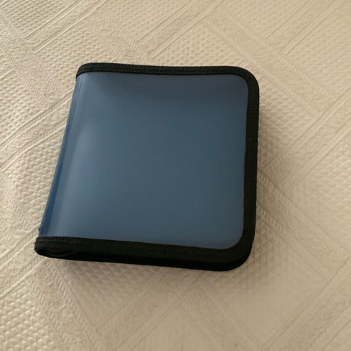 CD case like new, holds 24 CDs, ideal for car use