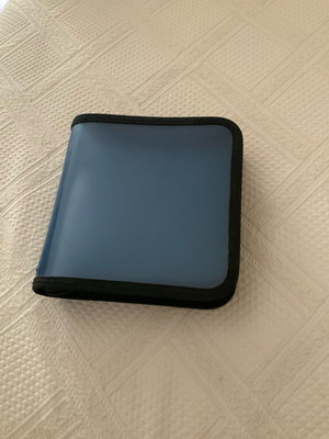 CD case like new, holds 24 CDs, ideal for car use