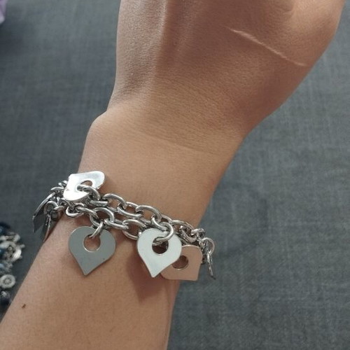 Charm bracelet with double chain and hanging hearts, like new, silver-tone