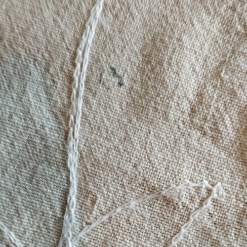 Linen tablecloth like new in earthy soft gray beige with embossed embroidery
