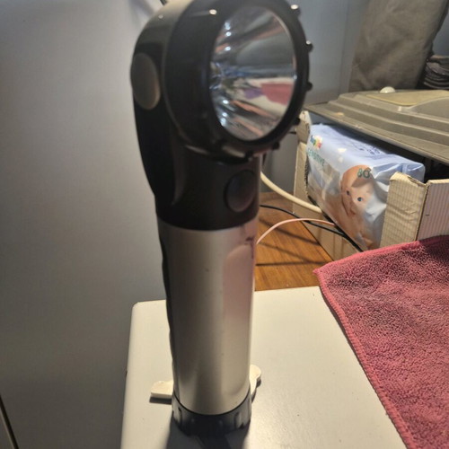 Osram professional flashlight used with magnetic base, tripod and adjustable head