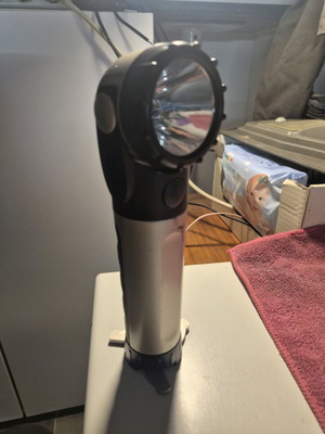 Osram professional flashlight used with magnetic base, tripod and adjustable head