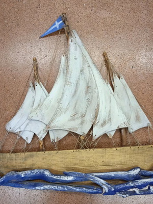 Wooden ship new from old wood and barrel wood