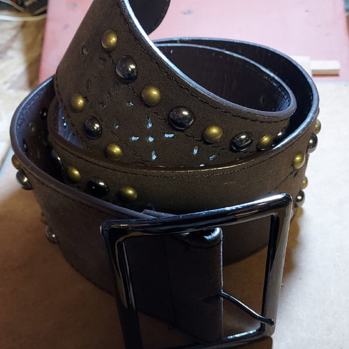 Three belts new with silver studs and stars