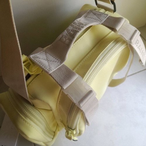 Rains shoulder bag, beige and yellow, waterproof fabric