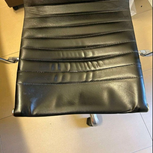 Neoset executive office chair used with ribbed black leather and chrome frame