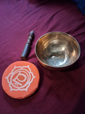 Tibetan Singing Bowl set like new with wooden striker and fabric base