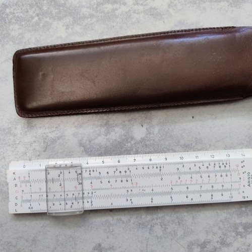Vintage logarithmic slide rule in case like new
