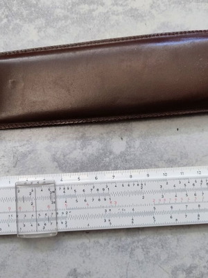 Vintage logarithmic slide rule in case like new