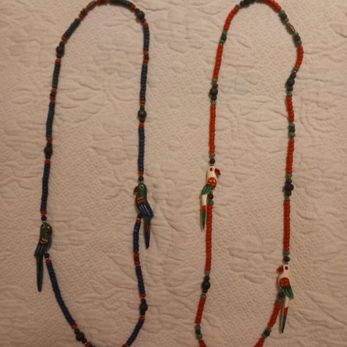Wooden necklaces like new with beads and parrots, set of two