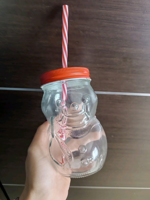 Glass Christmas cup used with straw