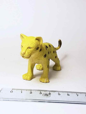 Animal plastic figure used with marks and scratches