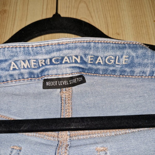 American Eagle flared jeans with rips like new, size L