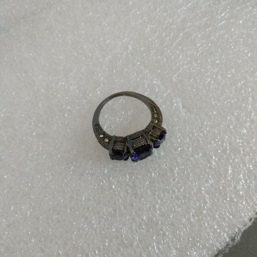 Ring with Purple Crystals and Black Plated Finish like new