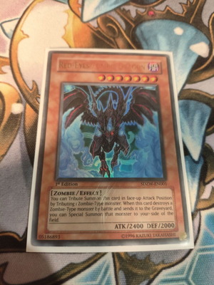 Red-Eyes Zombie Dragon Yu-Gi-Oh card used, damaged condition