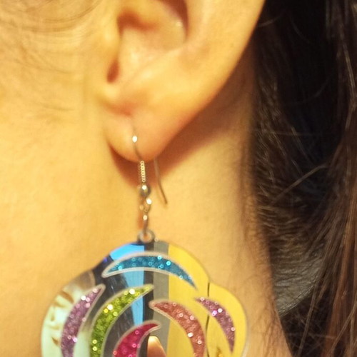Plastic earrings used with glitter