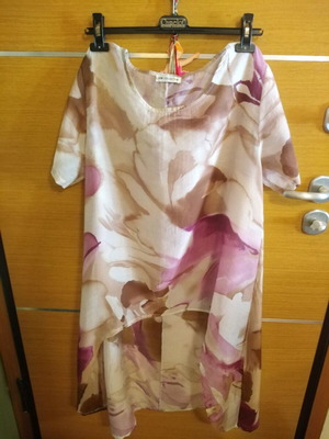 Floral blouse airy like new, longer at the back