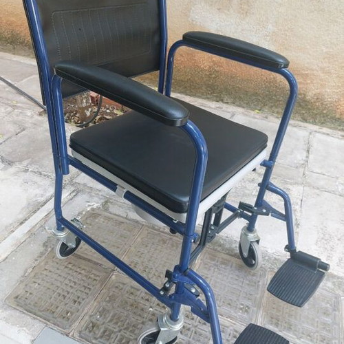 Commode wheelchair with metal frame, like new