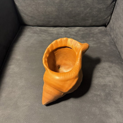 Clay flowerpot in shell shape like new
