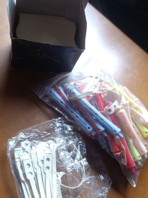Perm rods with rubber bands and papers used, set of 34