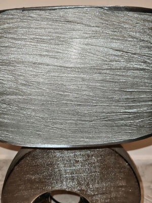 Table lamp used with silver shade