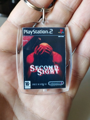 Second Sight PS2 keychain, acrylic