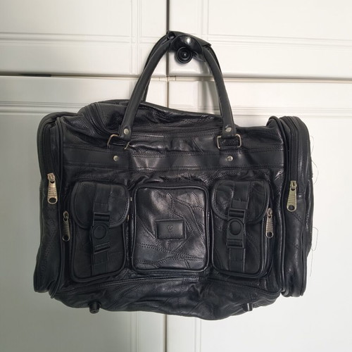 Travel bag like new, black, synthetic leather with extra strap