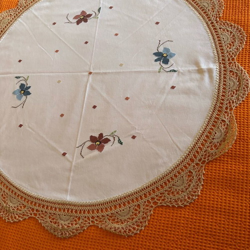 Round doily or small woven tablecloth with handmade edging like new
