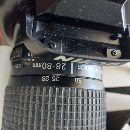Nikon F70 used with 28-80 lens and case
