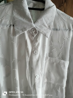 White transparent women's shirt with embossed details, new, size L