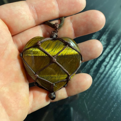 Tigers eye heart pendant made of semi-precious stone like new