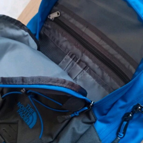 The North Face backpack brand new, black and blue