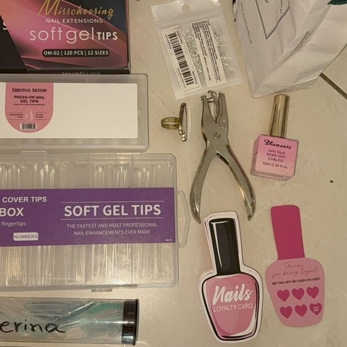 Nail products set like new with dual forms, tips, and accessories