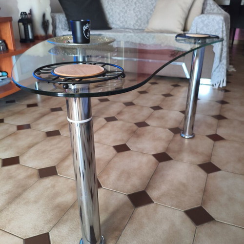 Glass coffee table with metal legs