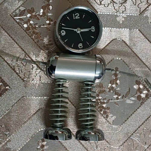 Table clock robot silver like new, analog