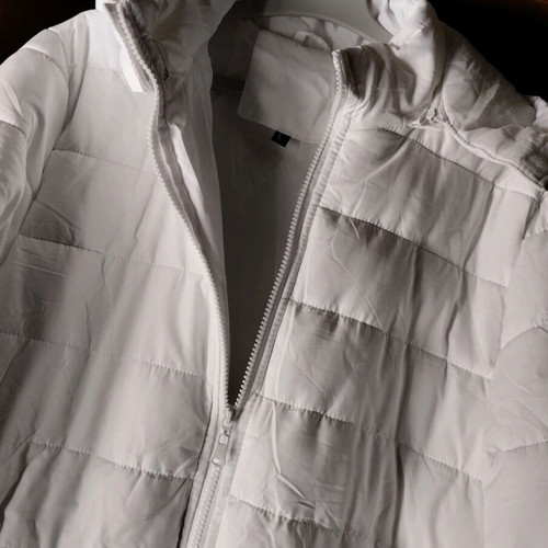 Jacket new size L white, lightweight and warm