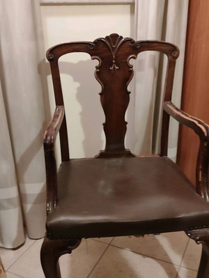 Antique armchair used, wooden with leather seat