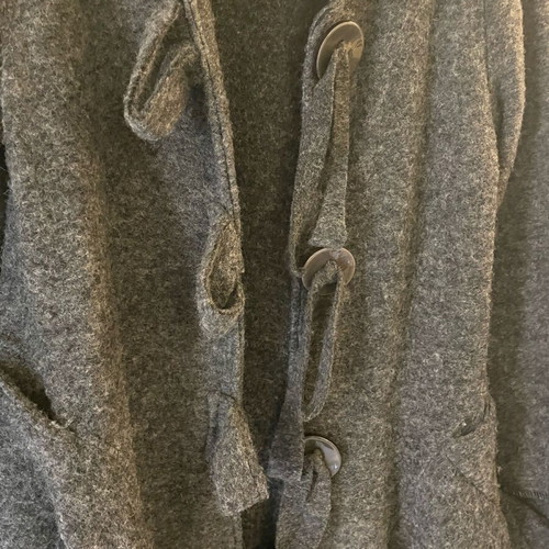 Long coat used with large buttons