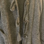 Long coat used with large buttons