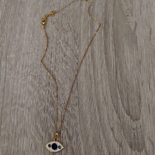 Women's steel evil eye pendant like new, white and gold