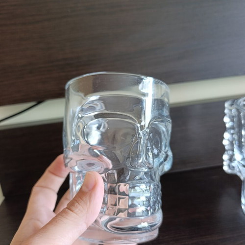 Skull-shaped glasses like new, set of two