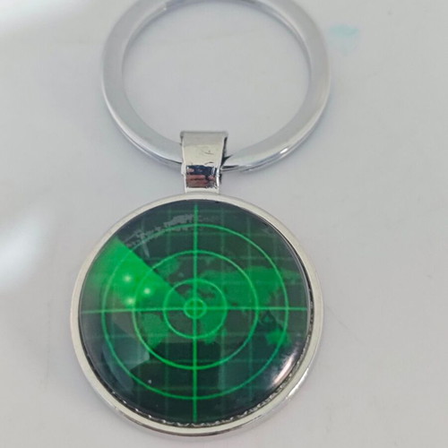 Metal keychain like new with green radar screen design
