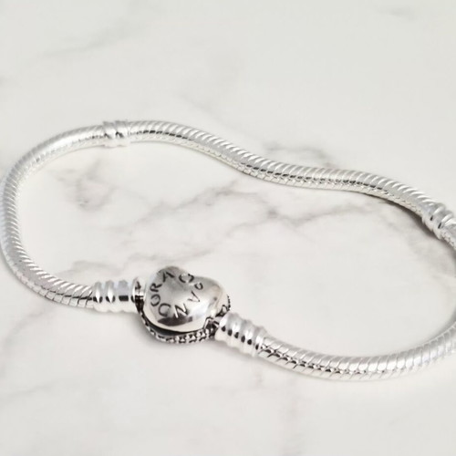 Pandora silver bracelet with heart clasp, new