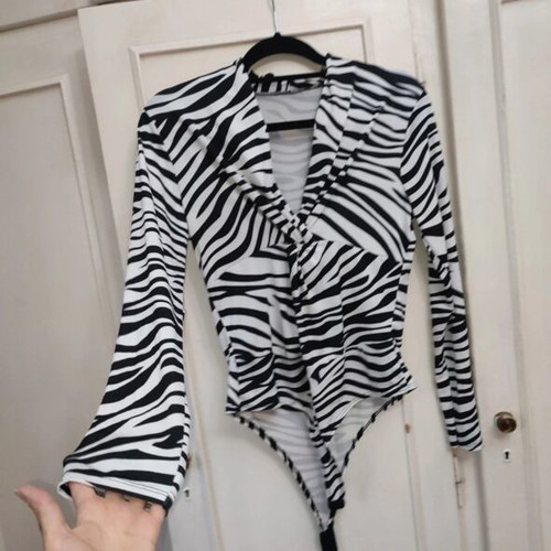 Long-sleeve zebra print bodysuit with V-neck and knot, like new