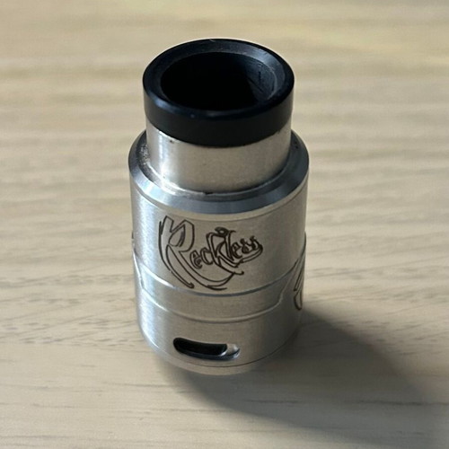 Phenom Vaporizers The Reckless RDA used, stainless steel