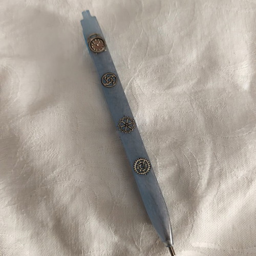 Unique pen with steampunk details in light blue