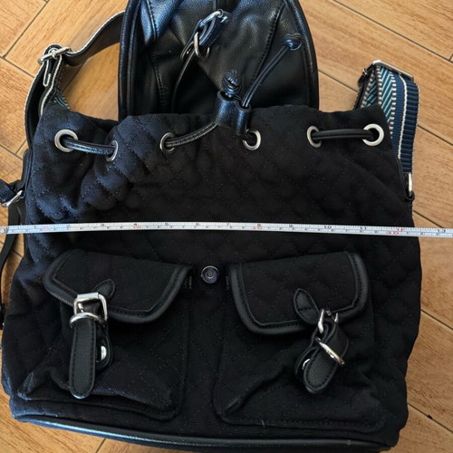 Migato backpack like new, black quilted with blue straps
