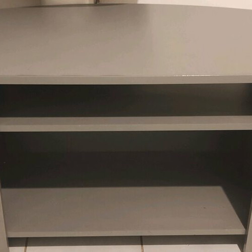 TV stand used, silver color with storage shelf