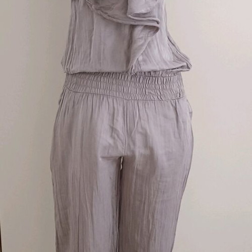Strapless jumpsuit used, gray brown with bow and ruffles